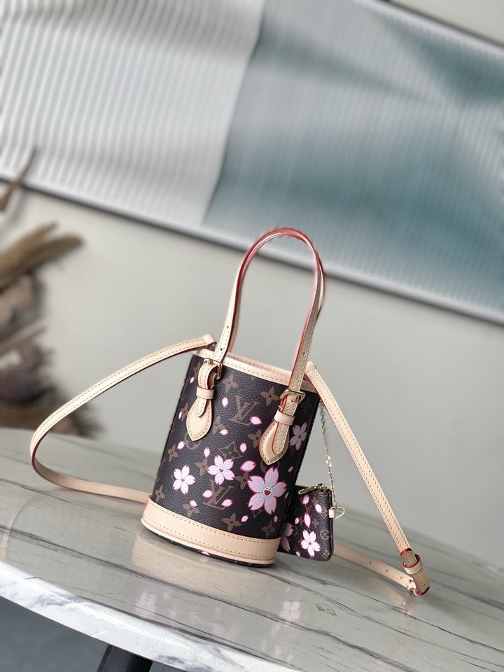 L X V Bucket Bags