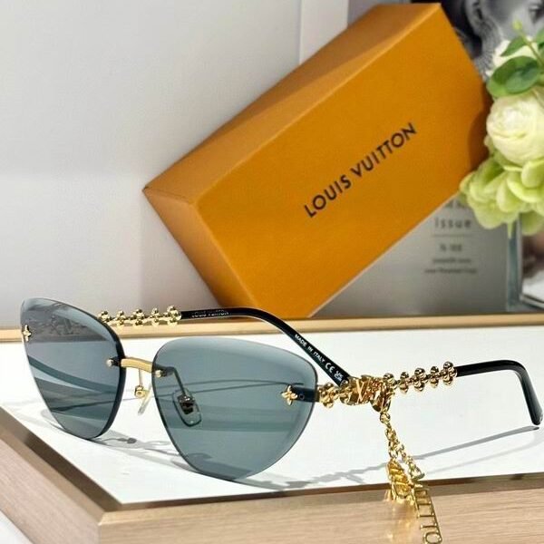 L X V Sunglasses